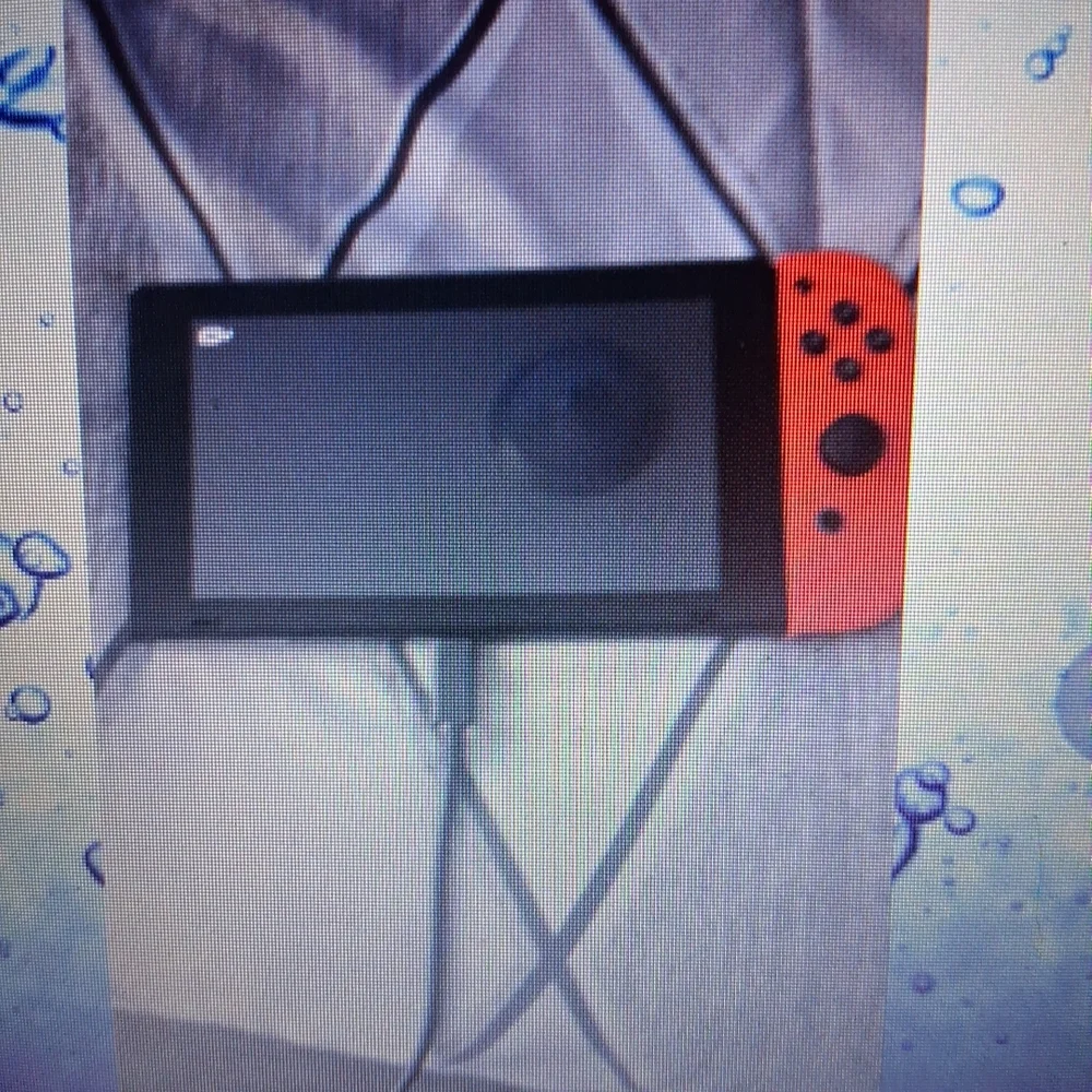 Nintendo Handheld Console with Red Controller